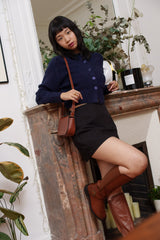 Bottes cavalières hautes à brides croisées et boucles